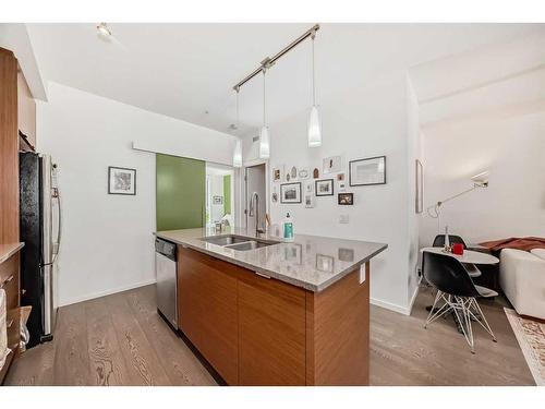 307-1719 9A Street Sw, Calgary, AB - Indoor Photo Showing Kitchen With Double Sink