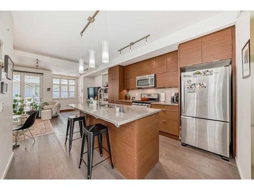 307-1719 9A Street Sw, Calgary, AB - Indoor Photo Showing Kitchen With Upgraded Kitchen