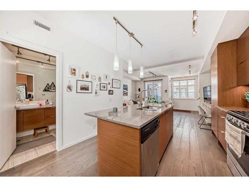 307-1719 9A Street Sw, Calgary, AB - Indoor Photo Showing Kitchen With Double Sink