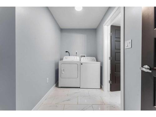 74 Nolanhurst Rise Nw, Calgary, AB - Indoor Photo Showing Laundry Room