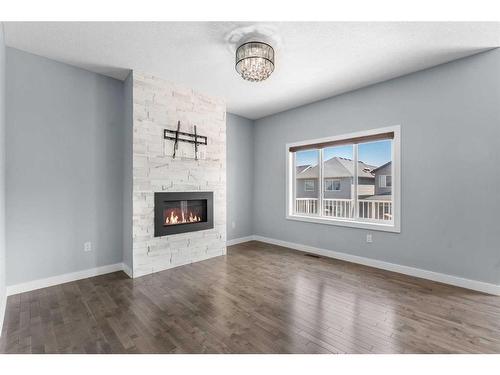 74 Nolanhurst Rise Nw, Calgary, AB - Indoor Photo Showing Living Room With Fireplace