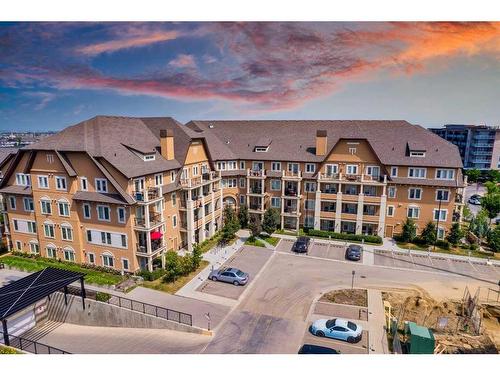 205-30 Mahogany Mews Se, Calgary, AB - Outdoor With Balcony With Facade