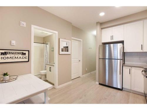 205-30 Mahogany Mews Se, Calgary, AB - Indoor Photo Showing Kitchen With Stainless Steel Kitchen