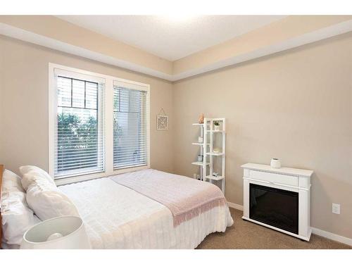 205-30 Mahogany Mews Se, Calgary, AB - Indoor Photo Showing Bedroom