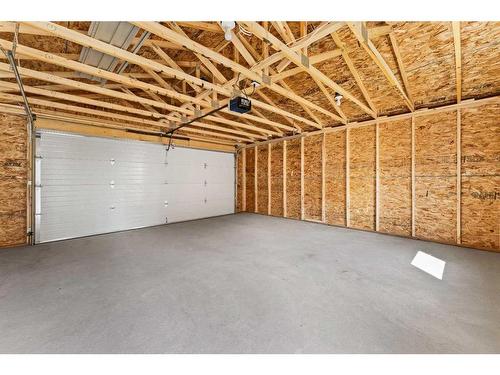 108 Silverado Plains View Sw, Calgary, AB - Indoor Photo Showing Garage