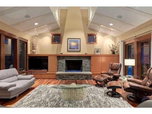 30 Discovery Ridge Manor Sw, Calgary, AB - Indoor Photo Showing Living Room With Fireplace