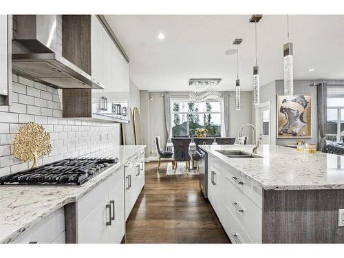 33 Evansview Court Nw, Calgary, AB - Indoor Photo Showing Kitchen With Double Sink With Upgraded Kitchen