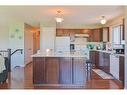 59 Beacham Rise Nw, Calgary, AB  - Indoor Photo Showing Kitchen With Double Sink 