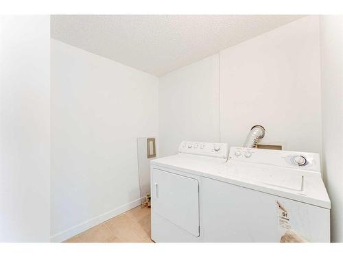 102-2316 17B Street Sw, Calgary, AB - Indoor Photo Showing Laundry Room