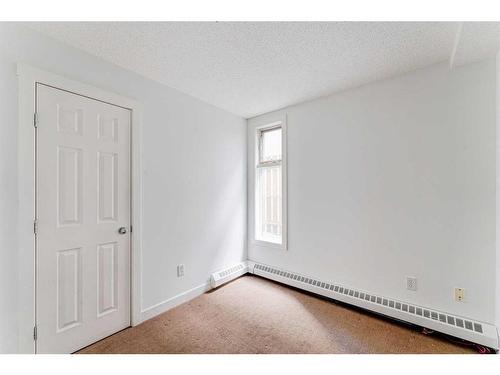 102-2316 17B Street Sw, Calgary, AB - Indoor Photo Showing Other Room