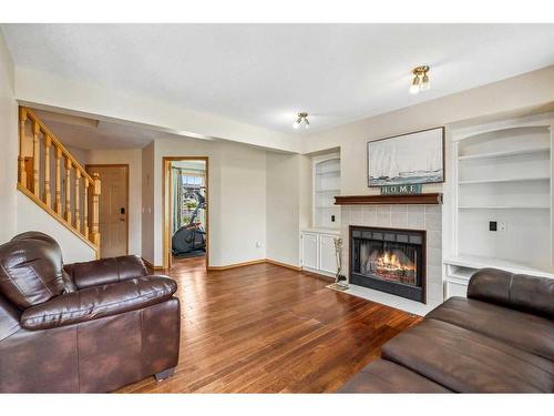 255 Del Ray Road Ne, Calgary, AB - Indoor Photo Showing Living Room With Fireplace