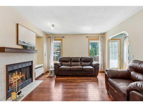 255 Del Ray Road Ne, Calgary, AB - Indoor Photo Showing Living Room With Fireplace