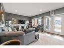 67 Cranbrook Way Se, Calgary, AB  - Indoor Photo Showing Living Room 