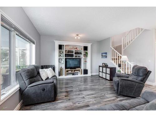 358 Sagewood Gardens Sw, Airdrie, AB - Indoor Photo Showing Living Room