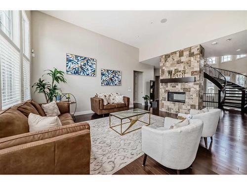 30 Silverado Ranch Way Sw, Calgary, AB - Indoor Photo Showing Living Room With Fireplace