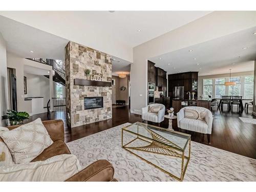 30 Silverado Ranch Way Sw, Calgary, AB - Indoor Photo Showing Living Room With Fireplace