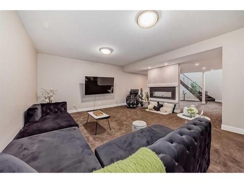 30 Silverado Ranch Way Sw, Calgary, AB - Indoor Photo Showing Living Room