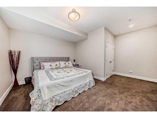 30 Silverado Ranch Way Sw, Calgary, AB - Indoor Photo Showing Bedroom