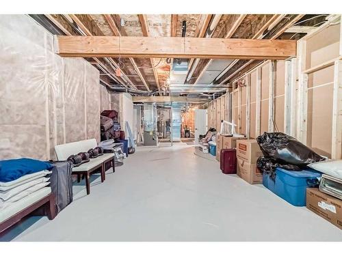 30 Silverado Ranch Way Sw, Calgary, AB - Indoor Photo Showing Basement