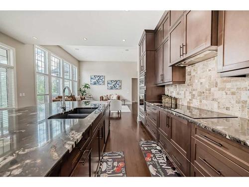 30 Silverado Ranch Way Sw, Calgary, AB - Indoor Photo Showing Kitchen With Double Sink With Upgraded Kitchen