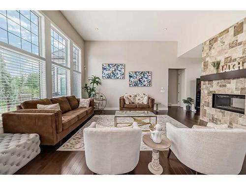 30 Silverado Ranch Way Sw, Calgary, AB - Indoor Photo Showing Living Room With Fireplace