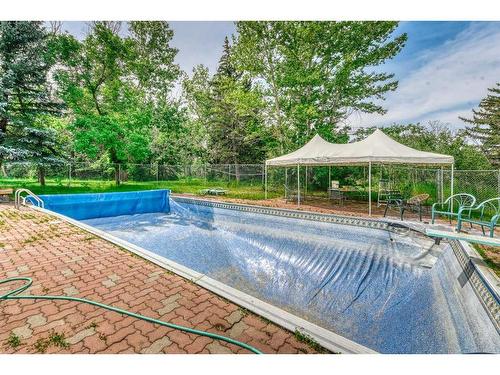 243083 16 Street East, Rural Foothills County, AB - Outdoor With In Ground Pool With Backyard