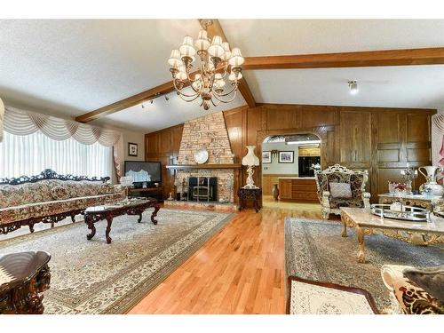 243083 16 Street East, Rural Foothills County, AB - Indoor Photo Showing Other Room With Fireplace