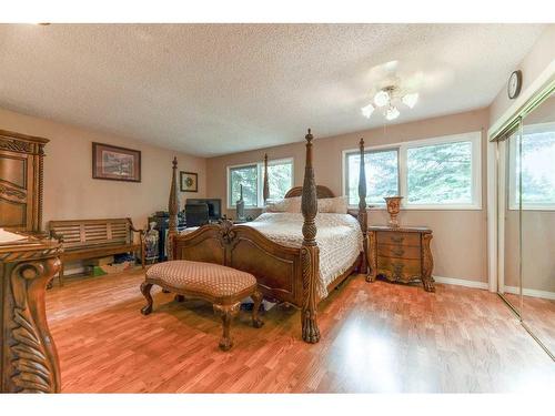 243083 16 Street East, Rural Foothills County, AB - Indoor Photo Showing Bedroom