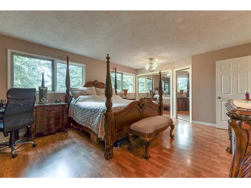 243083 16 Street East, Rural Foothills County, AB - Indoor Photo Showing Bedroom