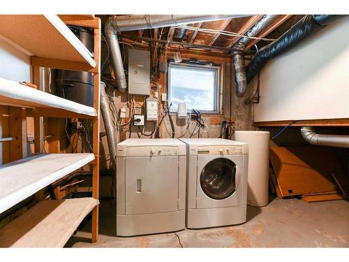 243083 16 Street East, Rural Foothills County, AB - Indoor Photo Showing Laundry Room