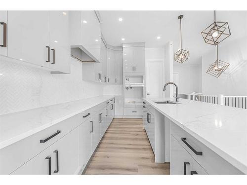 303 Muirfield Crescent, Lyalta, AB - Indoor Photo Showing Kitchen With Double Sink With Upgraded Kitchen