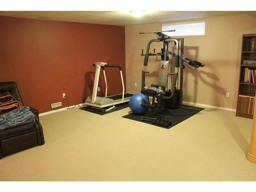 501 Shawinigan Drive Sw, Calgary, AB - Indoor Photo Showing Gym Room