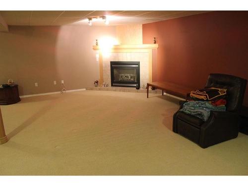 501 Shawinigan Drive Sw, Calgary, AB - Indoor With Fireplace