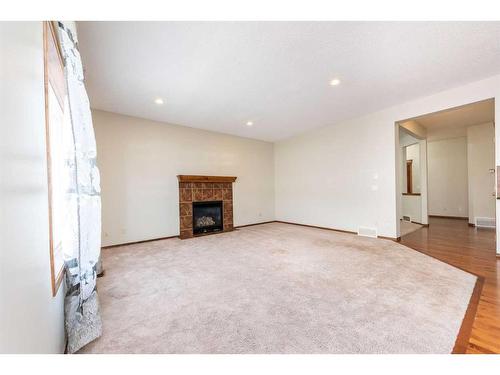 126 Panamount Street Nw, Calgary, AB - Indoor With Fireplace