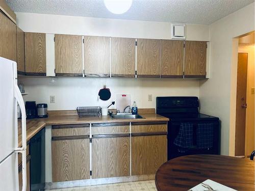 806-5204 Dalton Drive Nw, Calgary, AB - Indoor Photo Showing Kitchen