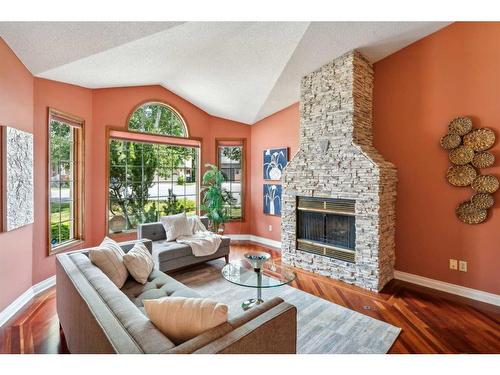 31 Scenic Ridge Crescent Nw, Calgary, AB - Indoor Photo Showing Living Room With Fireplace