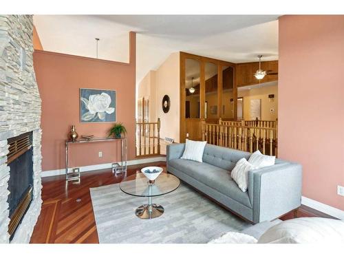 31 Scenic Ridge Crescent Nw, Calgary, AB - Indoor Photo Showing Living Room With Fireplace