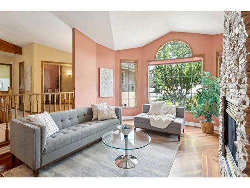 31 Scenic Ridge Crescent Nw, Calgary, AB - Indoor Photo Showing Living Room With Fireplace