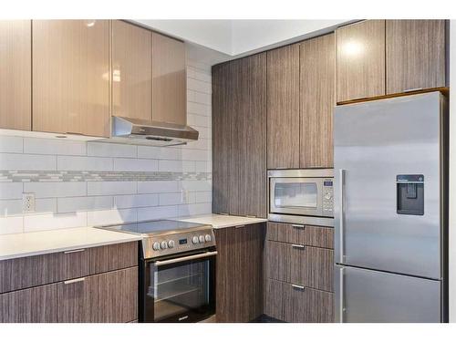 1607-930 6 Avenue Sw, Calgary, AB - Indoor Photo Showing Kitchen With Stainless Steel Kitchen