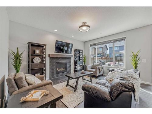 41 Howse Mount Ne, Calgary, AB - Indoor Photo Showing Living Room With Fireplace