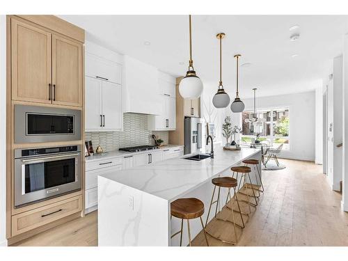 1820 19 Avenue Nw, Calgary, AB - Indoor Photo Showing Kitchen With Double Sink With Upgraded Kitchen