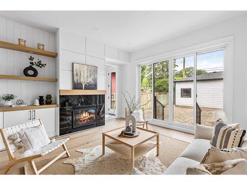 1820 19 Avenue Nw, Calgary, AB - Indoor Photo Showing Living Room With Fireplace