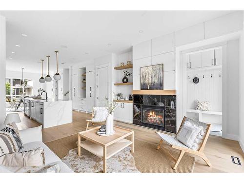 1820 19 Avenue Nw, Calgary, AB - Indoor Photo Showing Living Room With Fireplace