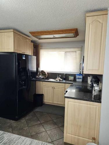 167 Whitman Place Ne, Calgary, AB - Indoor Photo Showing Kitchen With Double Sink