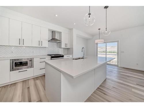 536 Walgrove Boulevard Se, Calgary, AB - Indoor Photo Showing Kitchen With Double Sink With Upgraded Kitchen