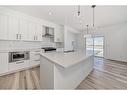 536 Walgrove Boulevard Se, Calgary, AB  - Indoor Photo Showing Kitchen With Double Sink With Upgraded Kitchen 