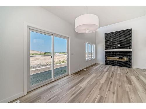 536 Walgrove Boulevard Se, Calgary, AB - Indoor With Fireplace