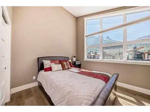 213 Riva Heights, Canmore, AB - Indoor Photo Showing Bedroom