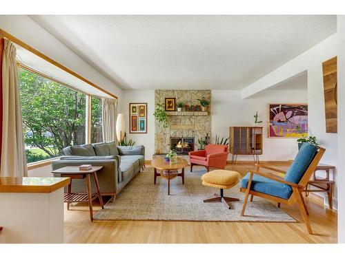 2919 14 Avenue Nw, Calgary, AB - Indoor Photo Showing Living Room With Fireplace