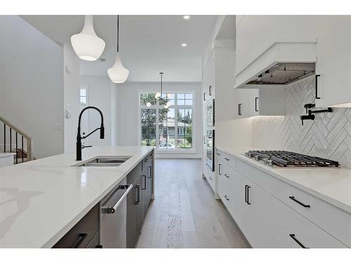 1141 Richland Road Ne, Calgary, AB - Indoor Photo Showing Kitchen With Double Sink With Upgraded Kitchen